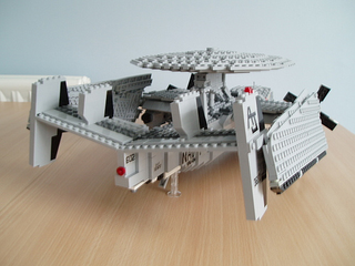 Illustration for article titled Giant LEGO B-1B Bomber Escorted by Fighters, Hawkeye Aircraft